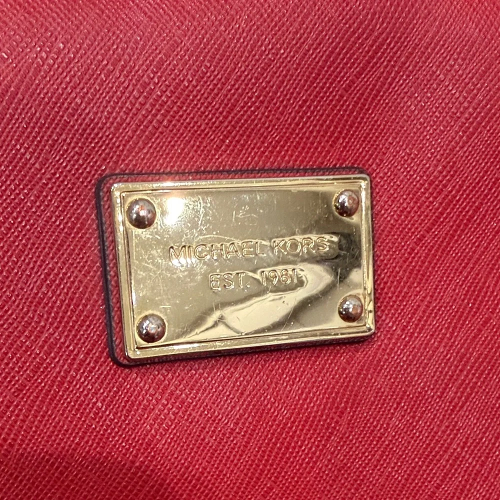 Michael Kors Crimson Laptop Case with Gold Accent